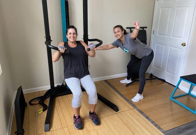 Personal Training client Mrs. AJ and Coach Corinne bodyweight row on Bodyweight Home Gym